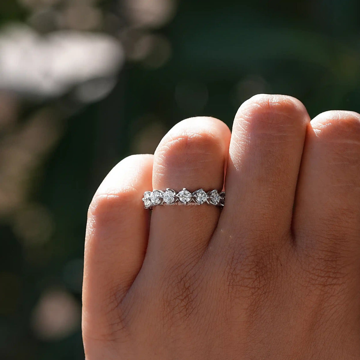 Close-Up View of Round Cut Diamond Eternity Wedding Band In White Gold 