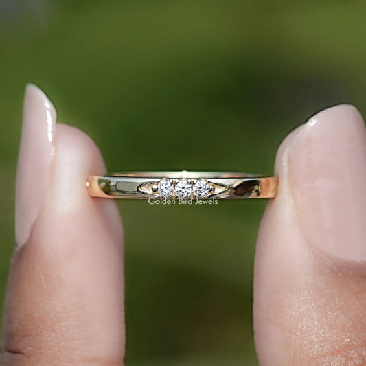 Yellow gold-tone eternity band with round-cut lab diamonds, thin profile