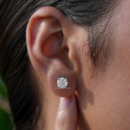 Side View of white lab diamond solitaire earings 
