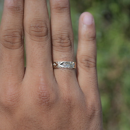 Silver men’s lab-diamond ring on hand, flat band with starburst prong detail