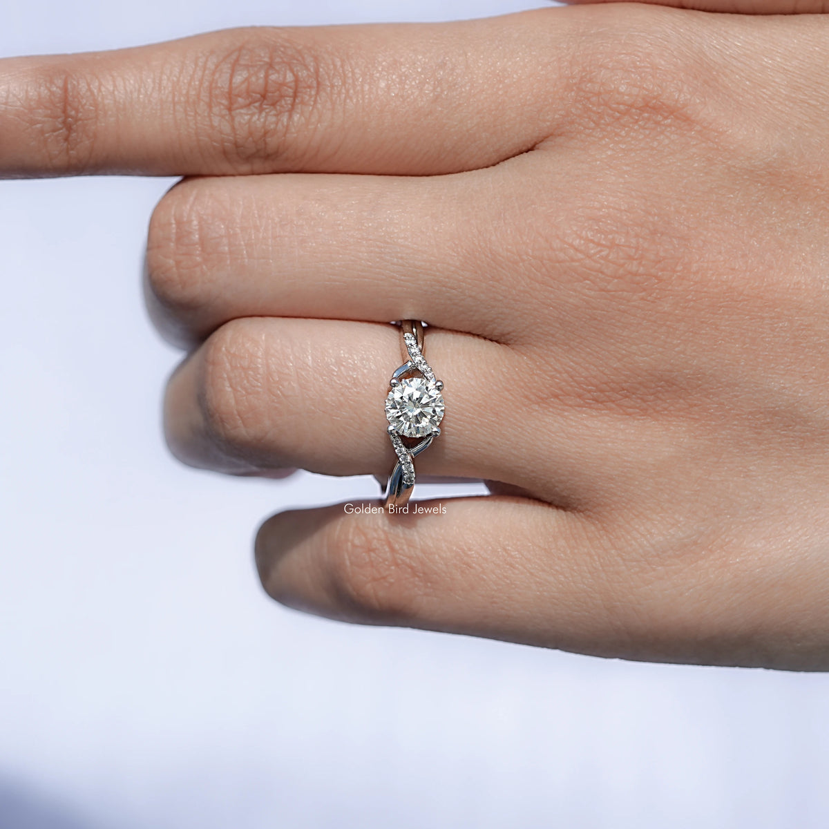 Close View Of Round Moissanite Criss Cross Solitaire Ring
