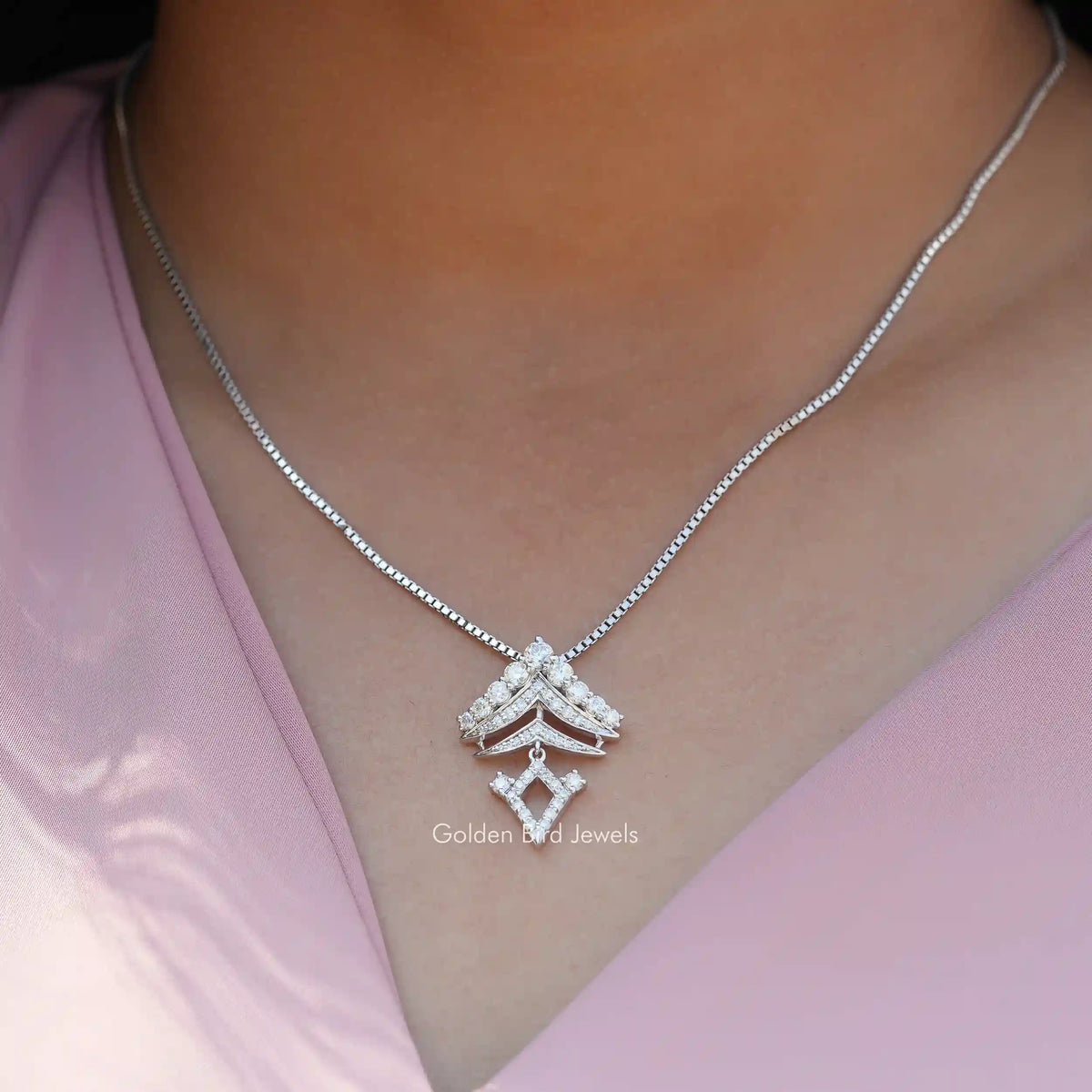 Full view of moissanite pendant in unique shape 