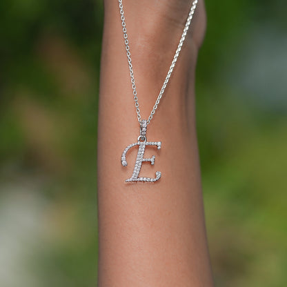 Close View Of E Letter moissanite pendant in Secure Setting 