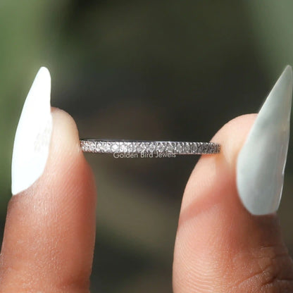 925 sterling silver round-cut moissanite eternity band, thin profile view