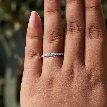 In finger view of Round Cut Moissanite Solitaire Ring