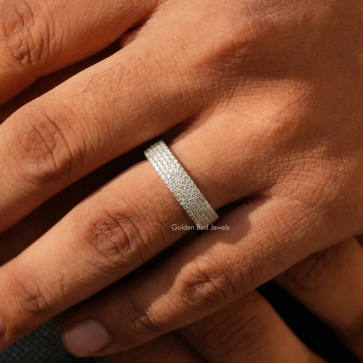 Close view of moissanite ring in a secure setting 