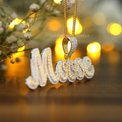 Side view of round cut moissanite pendant 