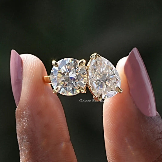 Toi et moi moissanite ring with two large round stones in prong settings