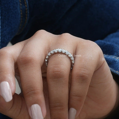 3/4 eternity band ring with round-cut moissanite stones, front view on fingers