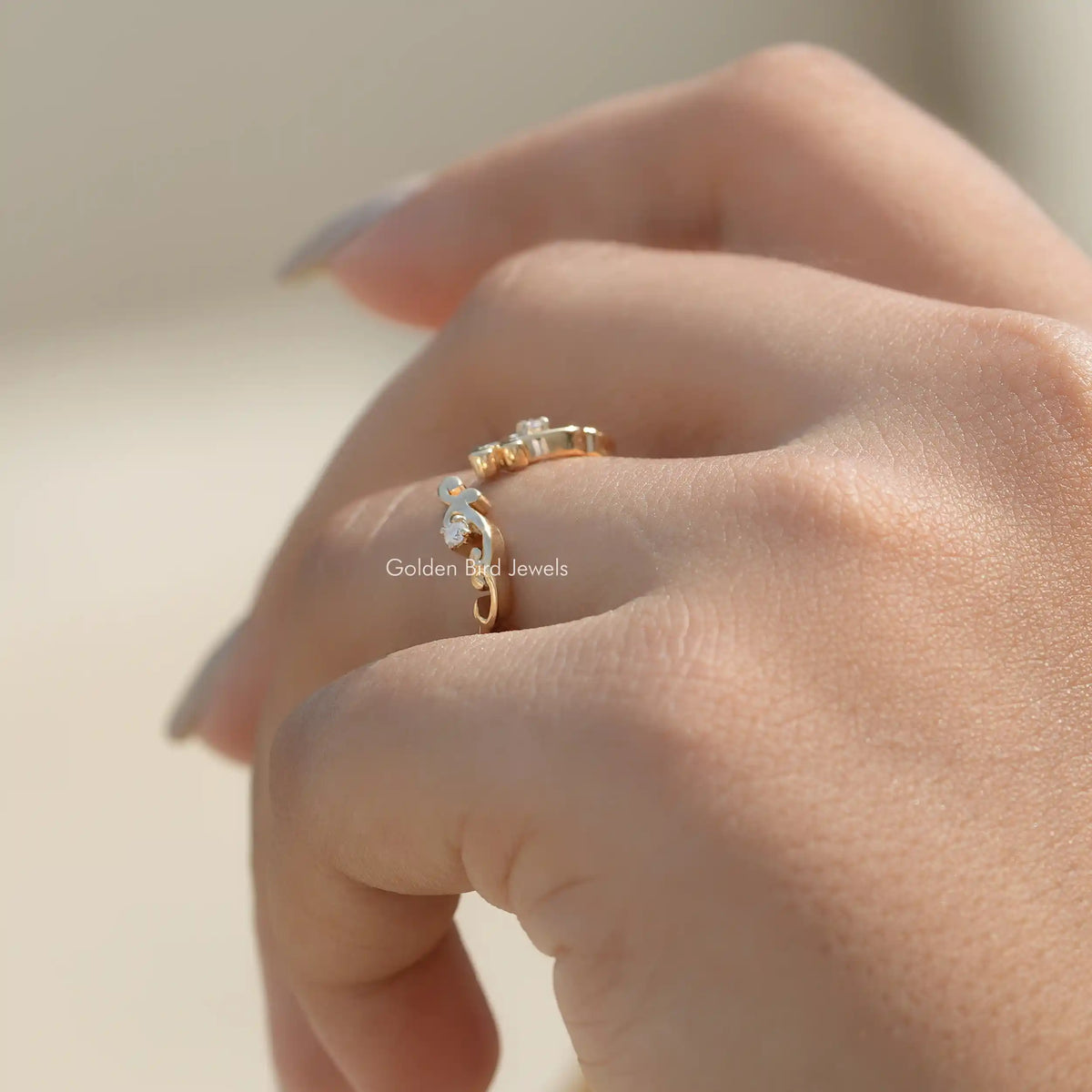 Gold-tone open cuff stacking band ring with round lab diamonds and open cuff detail