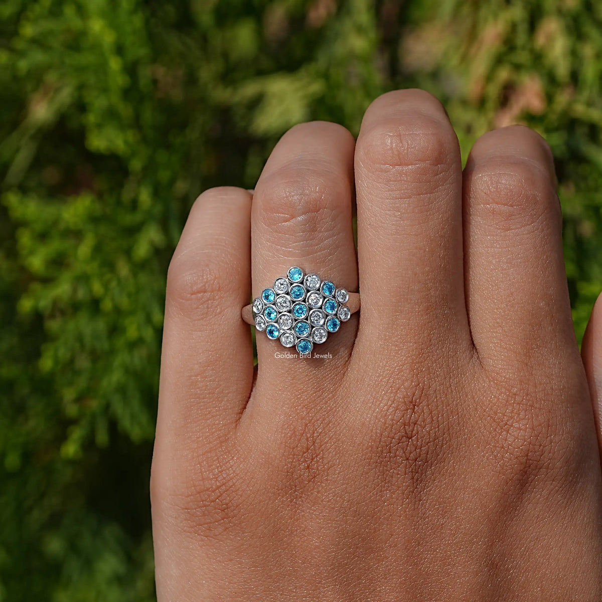 View of solitaire Paraiba lab diamond ring in prongs setting 