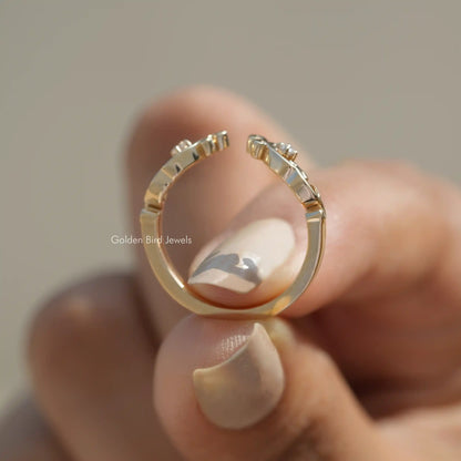 Gold-tone open cuff stacking band ring with round lab diamonds, side view on finger
