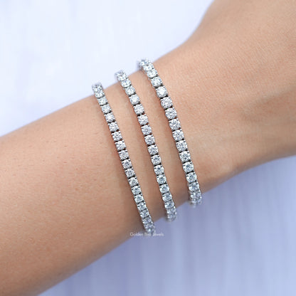 Silver round-cut lab diamond tennis bracelet, slender diamond bands on wrist