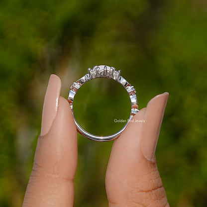 Opal halo ring back view with prong setting and small inset stones along the band