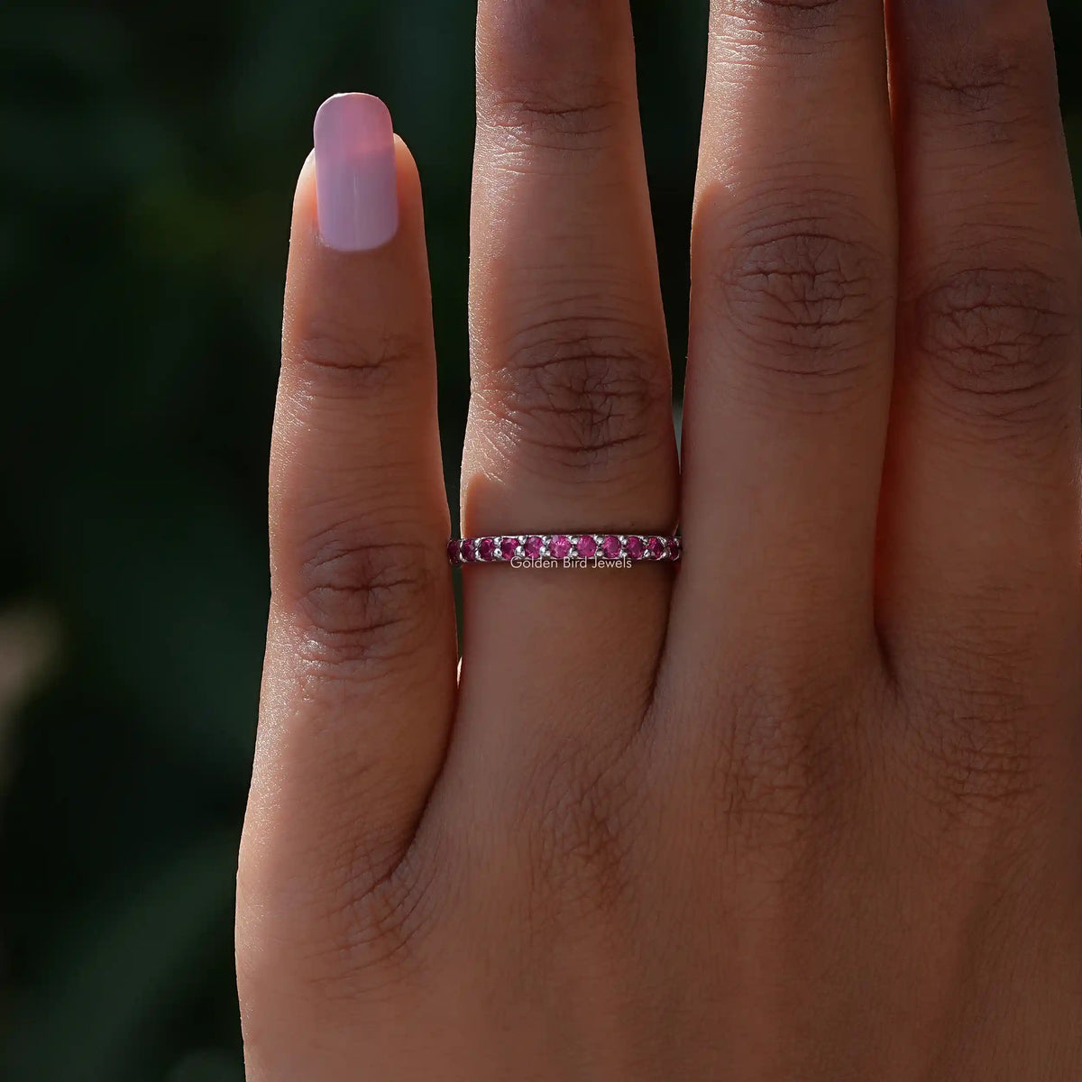 Close view of Pink Tourmaline Round Eternity Band