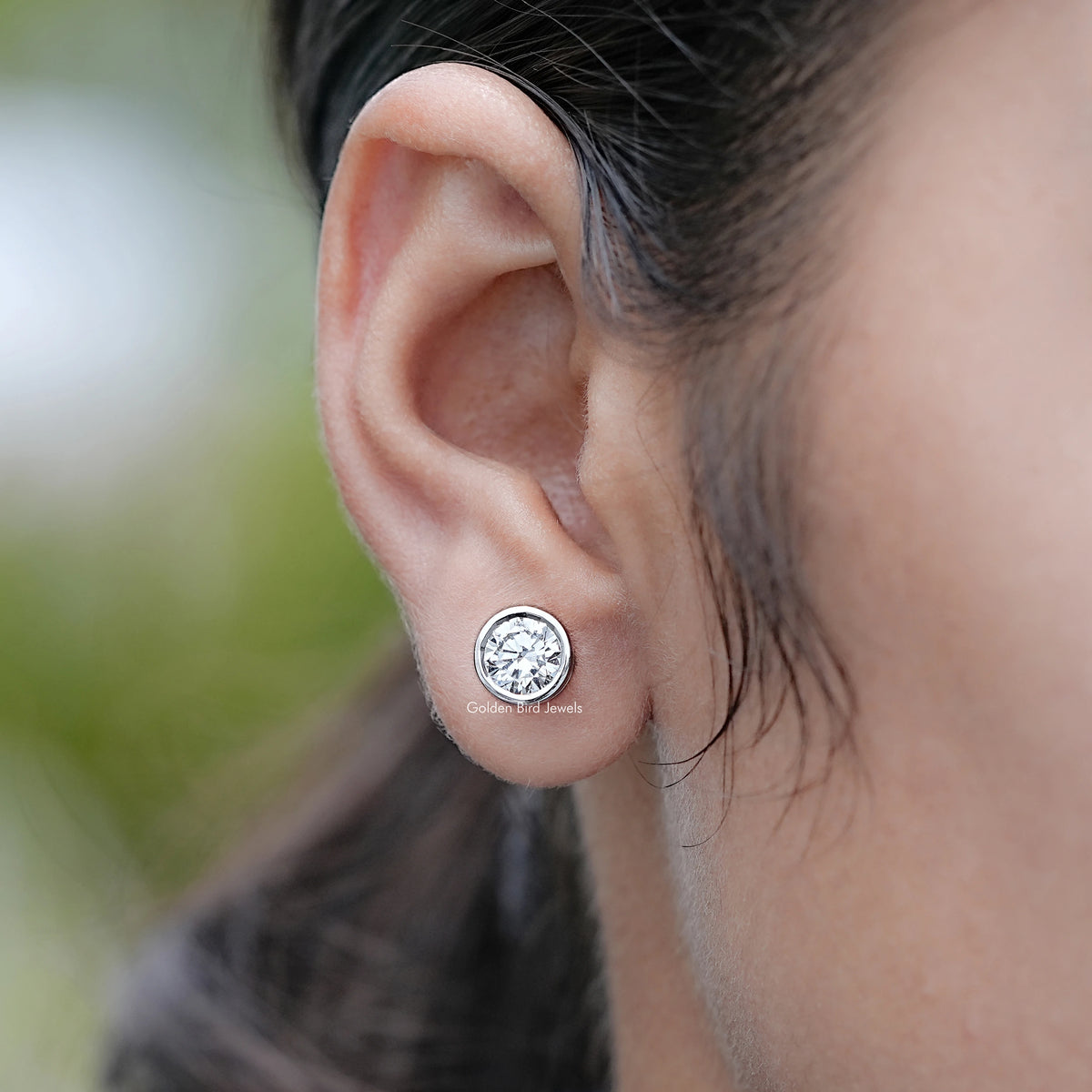 In Ear View of Lab Diamond Round Cut Bezel Stud Earrings
