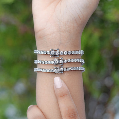 Round-cut lab diamond tennis bracelet in silver, four-row shimmer with clasp detail