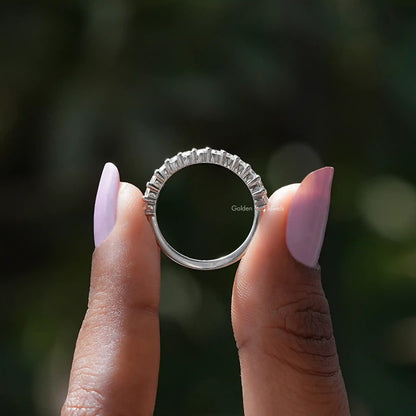 Silver diamond chevron stacking band ring from above with prong-set stones