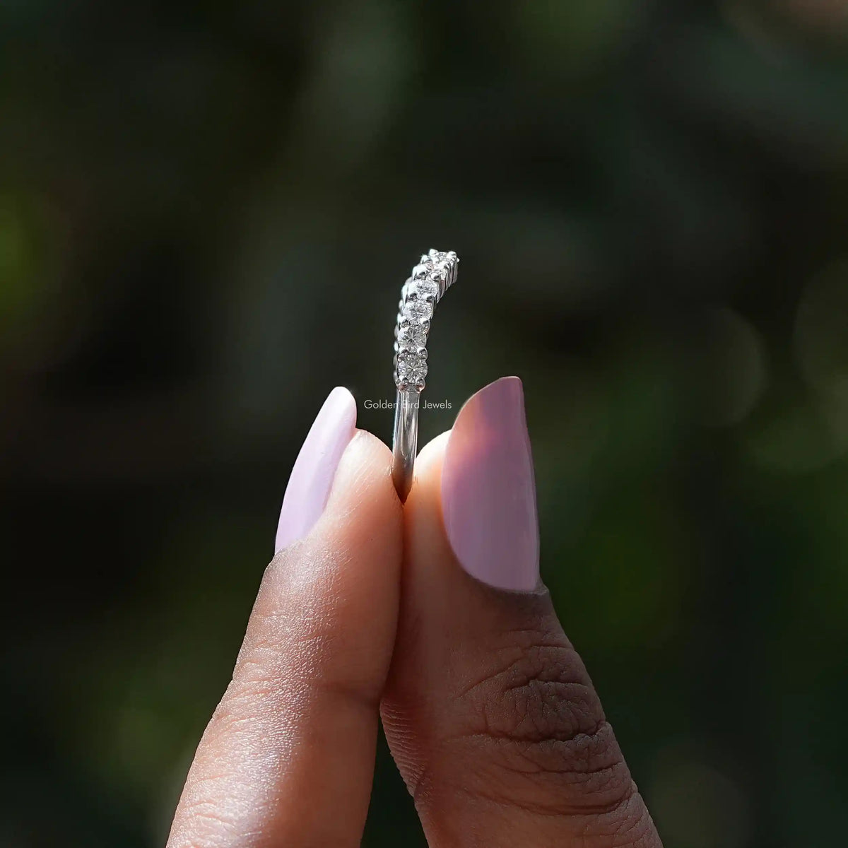 Silver diamond chevron stacking band ring showing side profile and stones