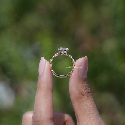 Round lab-grown diamond twist-shank ring, underside view with prongs visible