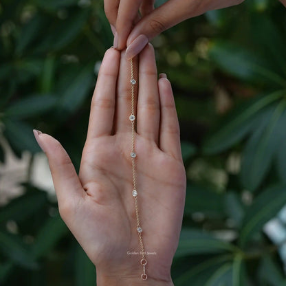 In hand showing view of moissanite bracelet