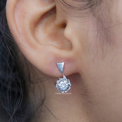 Silver dangling earrings with round colorless moissanite cluster and triangular prongs
