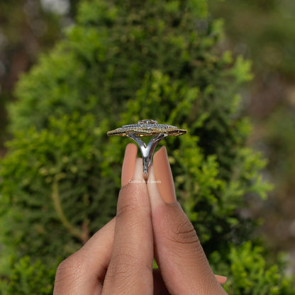 925 sterling silver ring with round moissanite center, split prongs, and halo setting