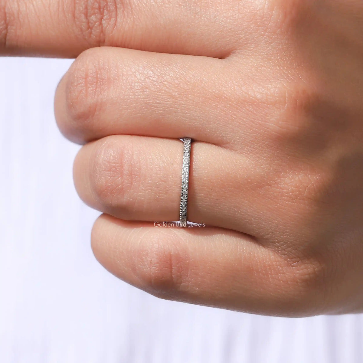925 sterling silver eternity band ring, close side view on hand