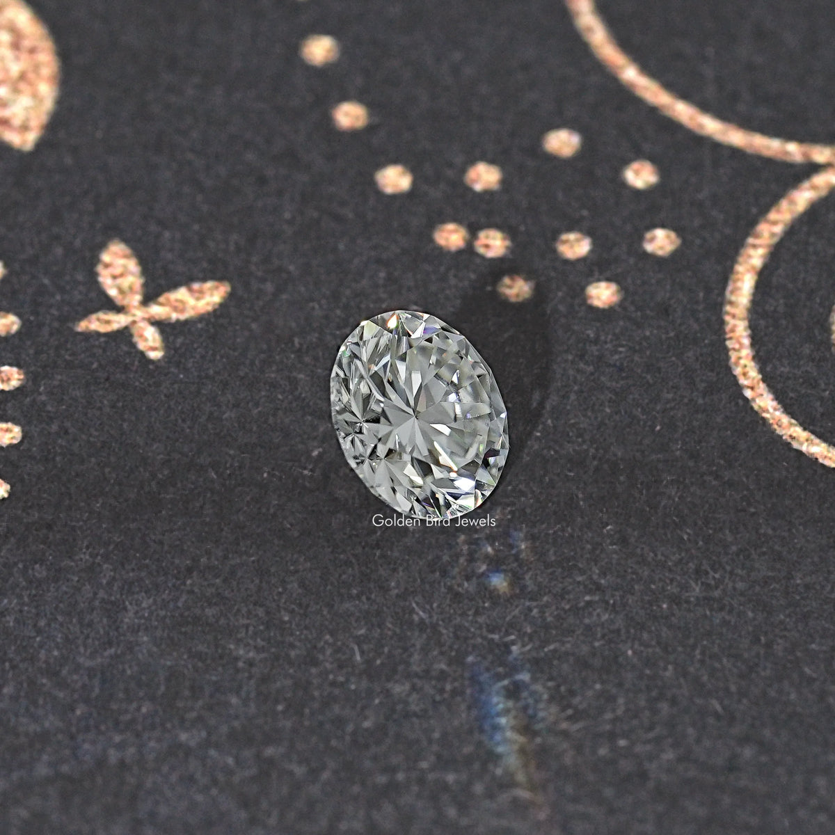 Round moissanite loose stone, round brilliant-cut, clear sparkle on dark slate background.