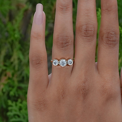 In finger view of Round Cut Solitaire Engagement Ring
