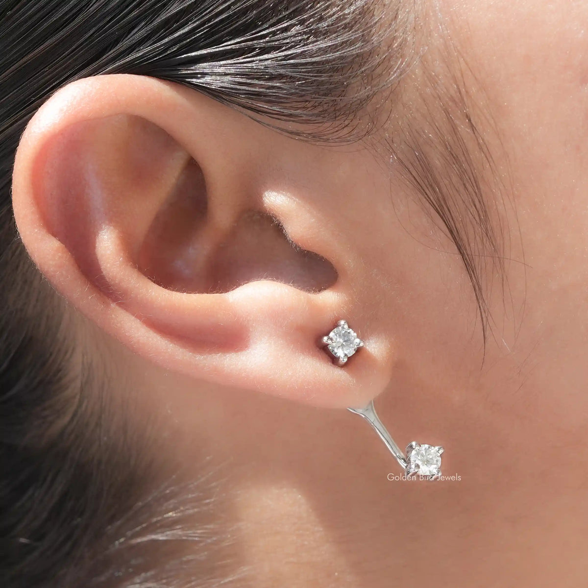 Silver-tone round moissanite drop earrings with screw-back closure, small bezel stones