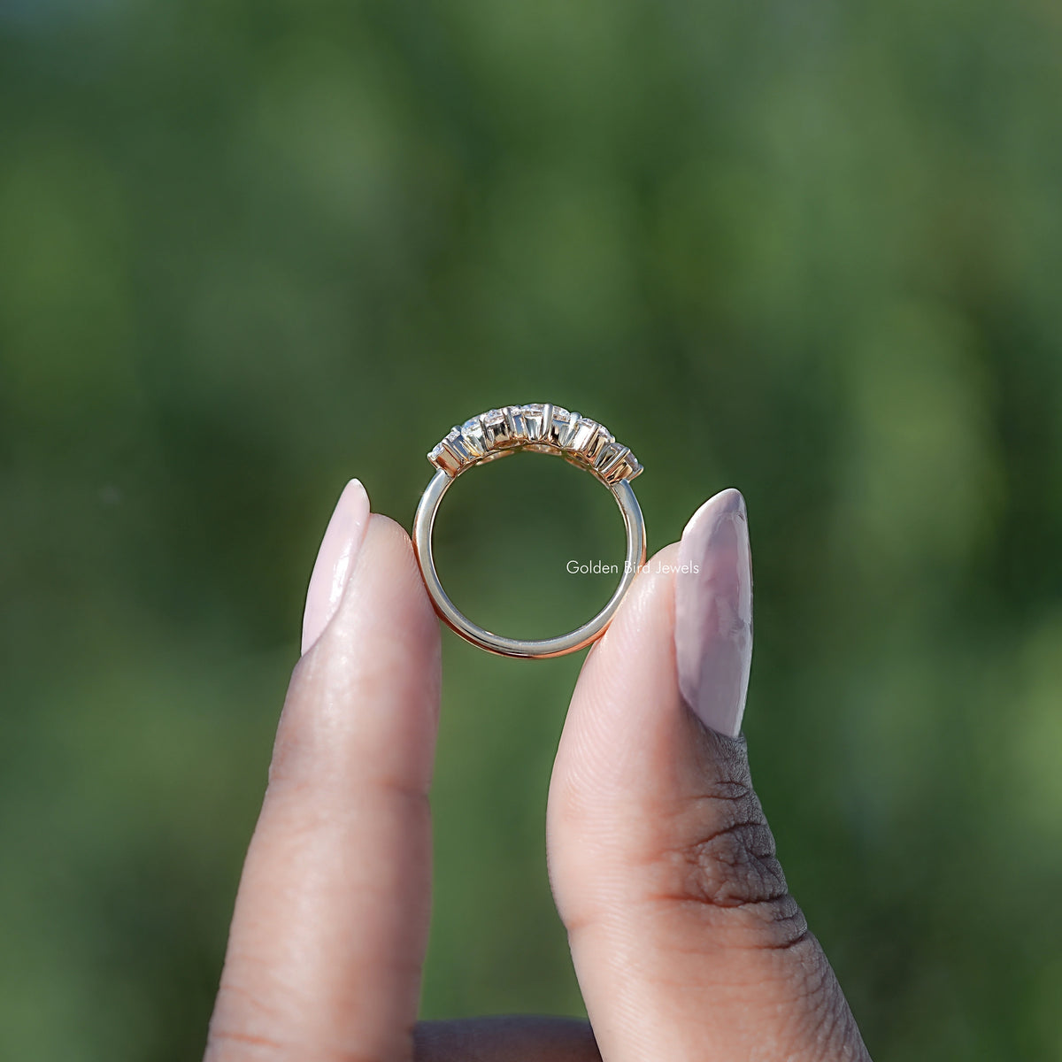 Back view of Round Shaped Solitaire Moissanite Ring Set in secure setting