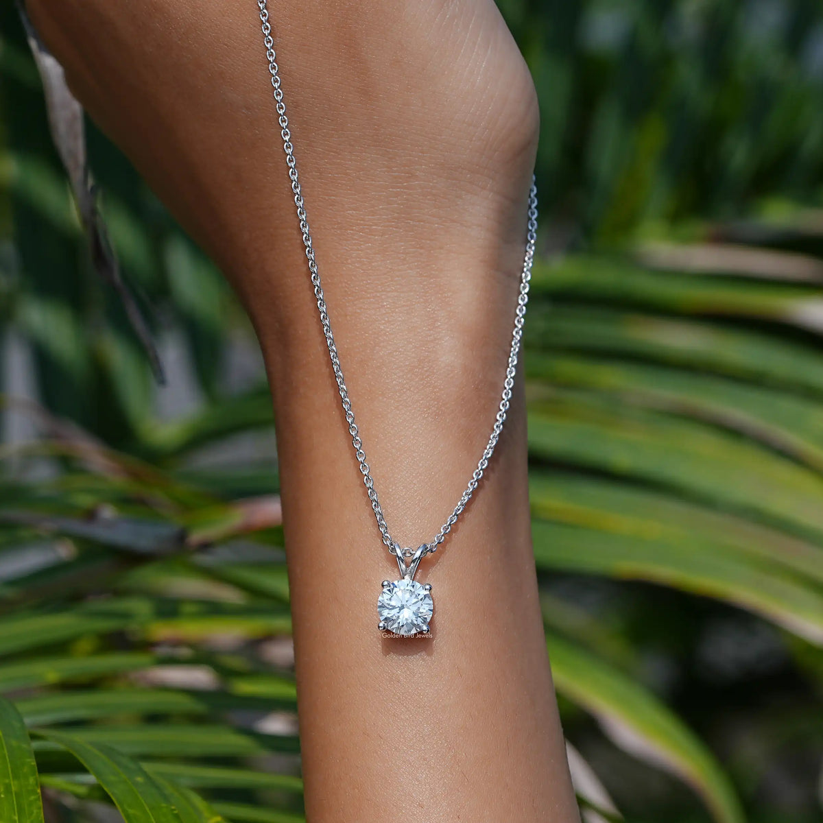 In Hand Showing View Of  Round Cut Diamond Pendant