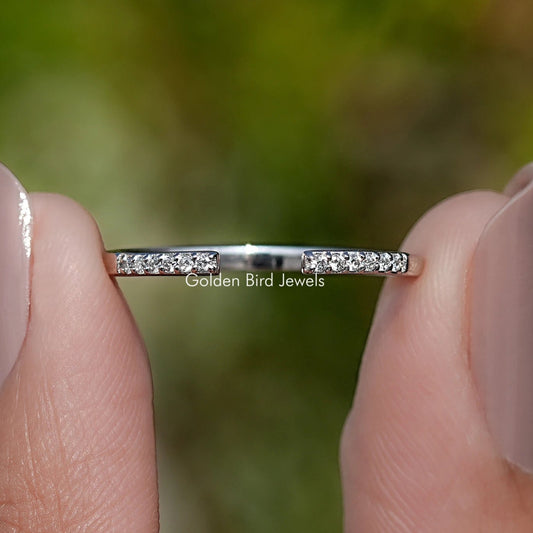 Round moissanite open cuff band with pavé stones on a thin silver setting
