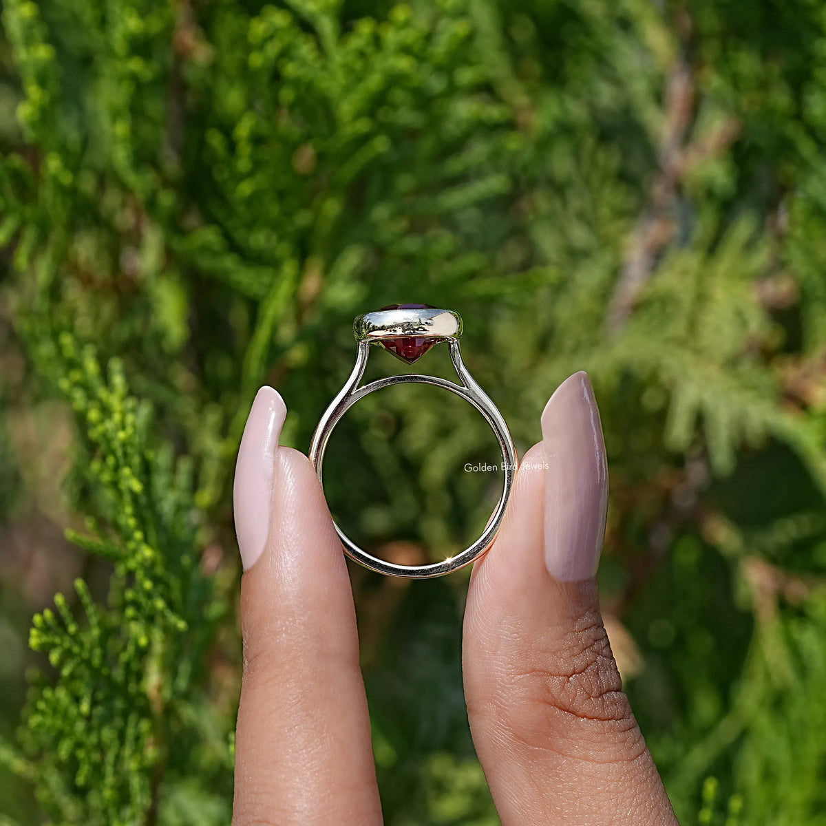 Side View of Ruby Red Oval Lab Gemstone Solitaire Ring
