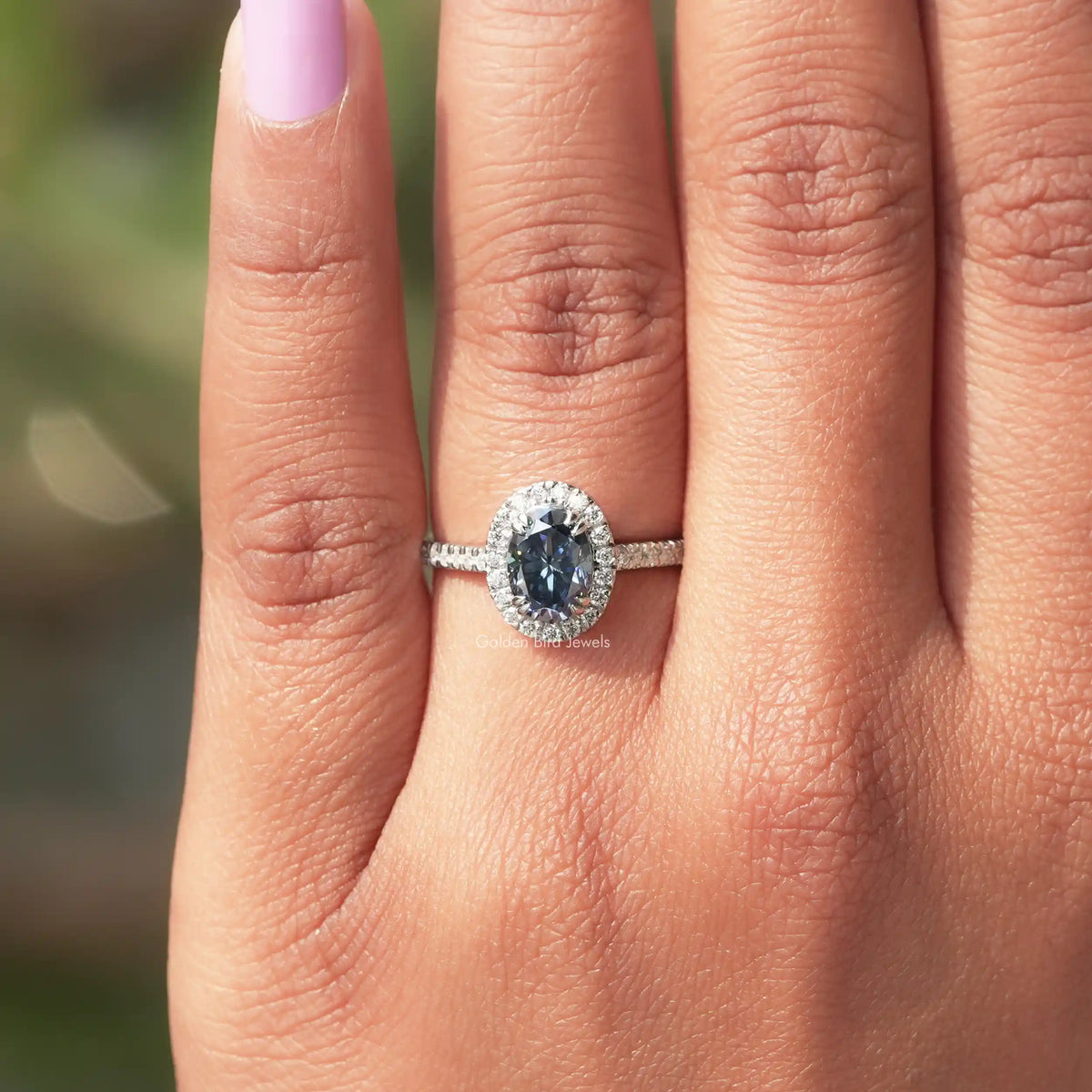View of Sapphire Blue Oval Engagement Ring In White Gold