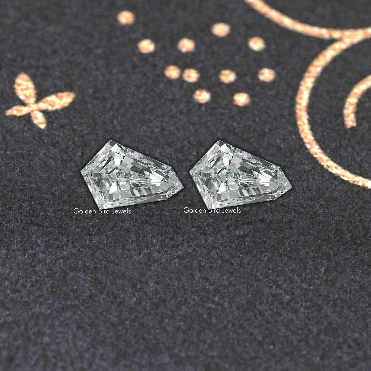 Shield-cut lab-grown diamond stud earrings, angled view of clear faceted stones