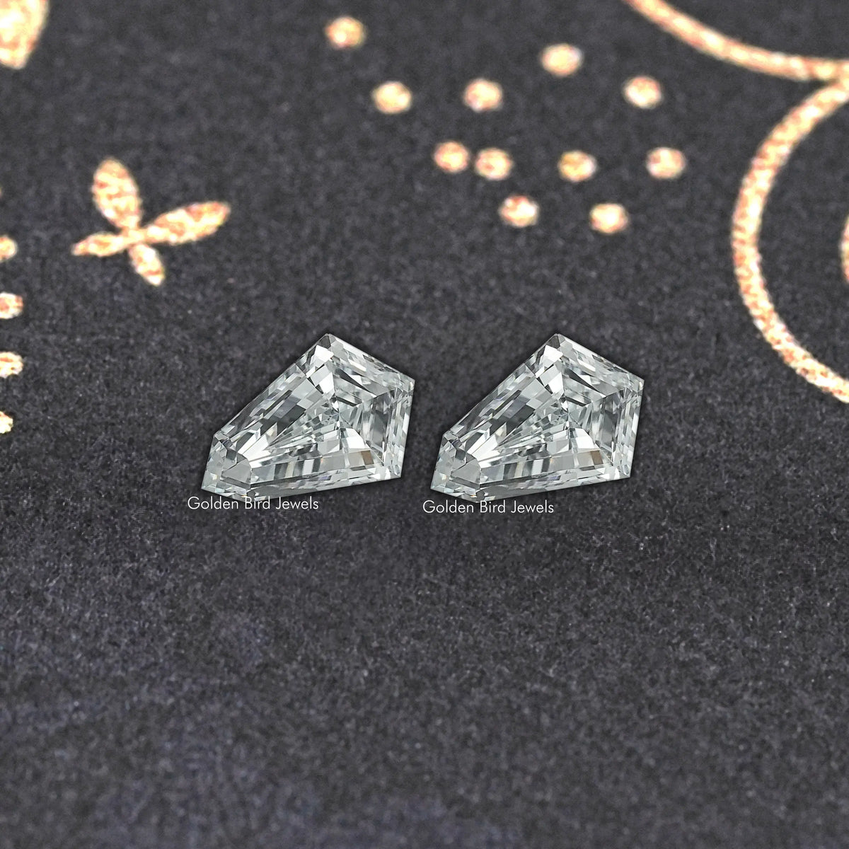 Shield-cut lab-grown diamond stud earrings with glossy clear facets