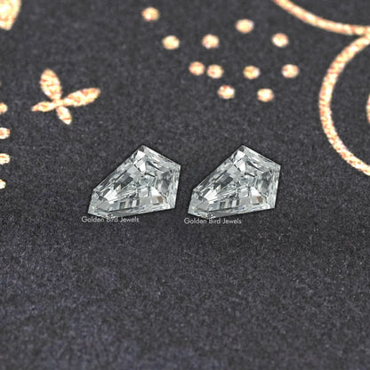 Shield-cut lab-grown diamond stud earrings with glossy clear facets