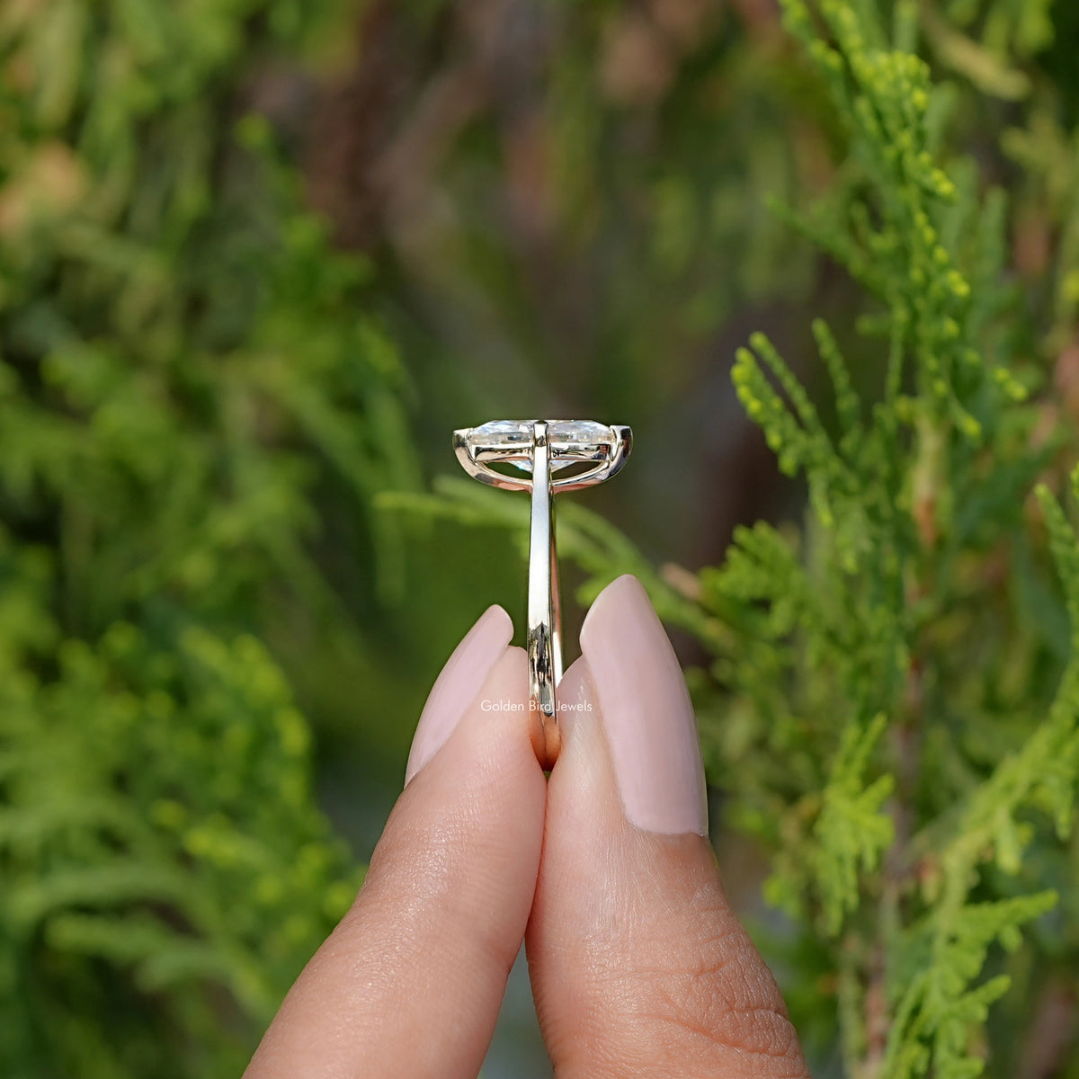 Side View Of Off White Marquise Moissanite Solitaire Ring  

