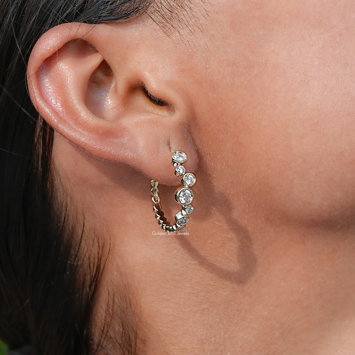 Side View of Round Cut Diamond Hoop Earrings In Yellow Gold