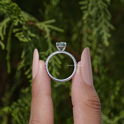 Oval-cut moissanite solitaire ring in sterling silver, shown side view