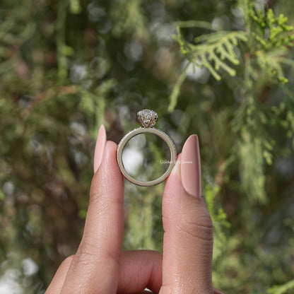 Silver marquise-cut moissanite solitaire ring with split band and small pave stones