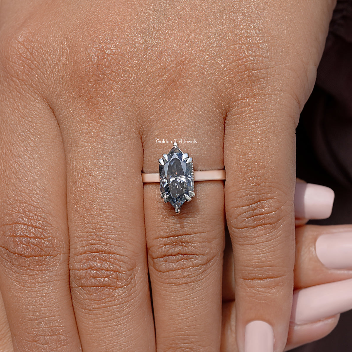 Marquise moissanite solitaire ring, marquise stone centered on straight band