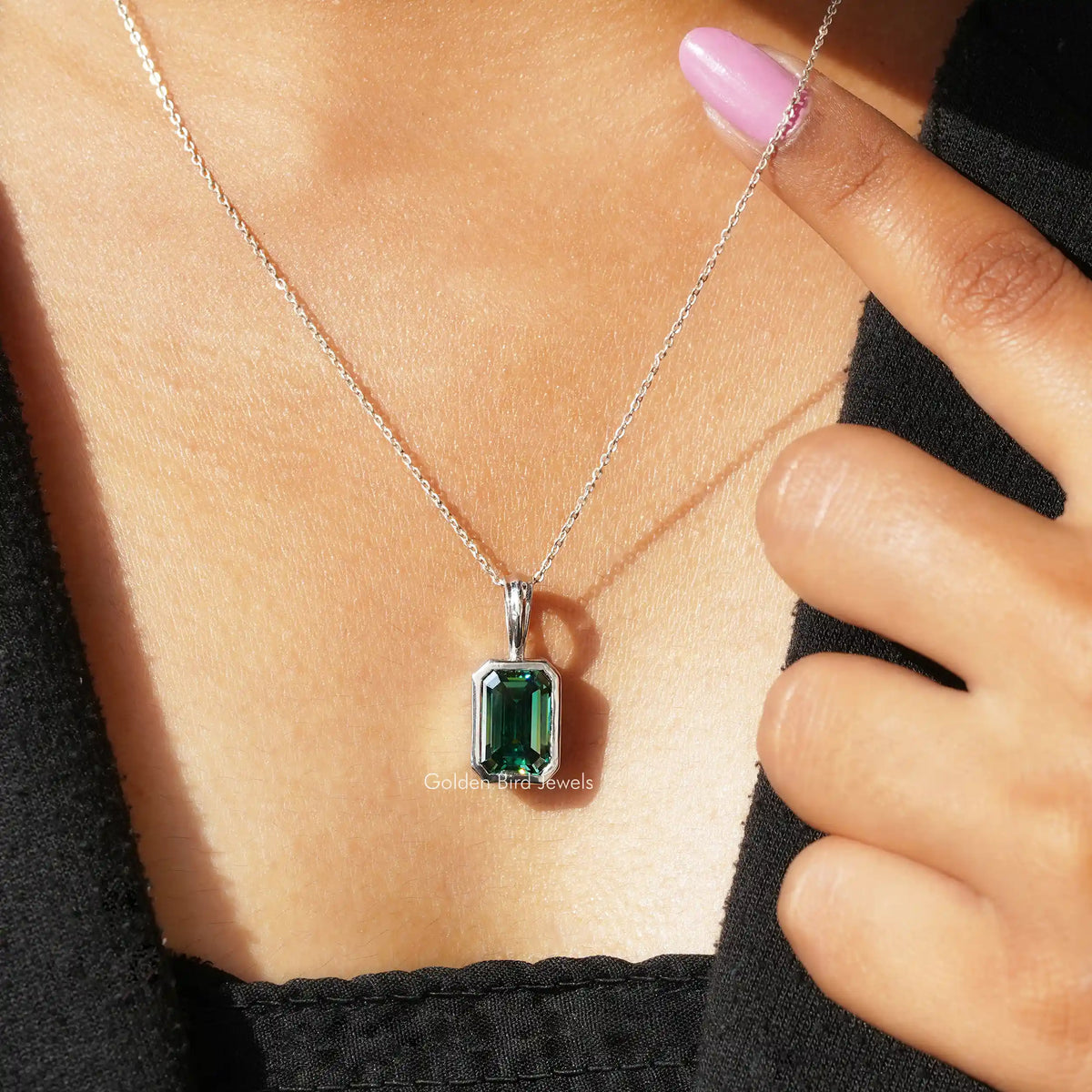 Full view of moissanite pendant in unique shape 