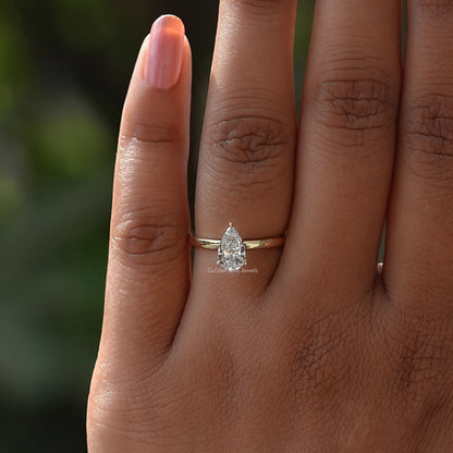 View of Pear Cut Diamond Shaped Solitaire Ring In Yellow Gold