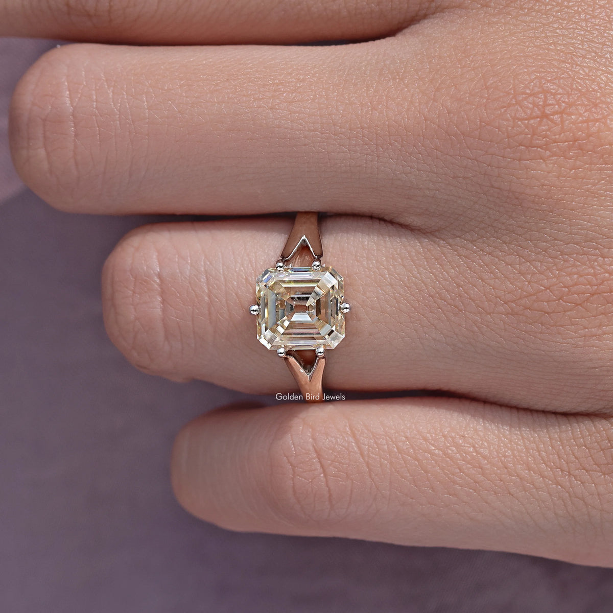 Yellow asscher-cut moissanite ring with split shank and four-prong square center