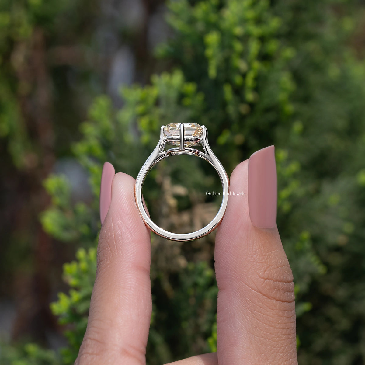 Split-shank ring with yellow asscher-cut stone centered, viewed from the side