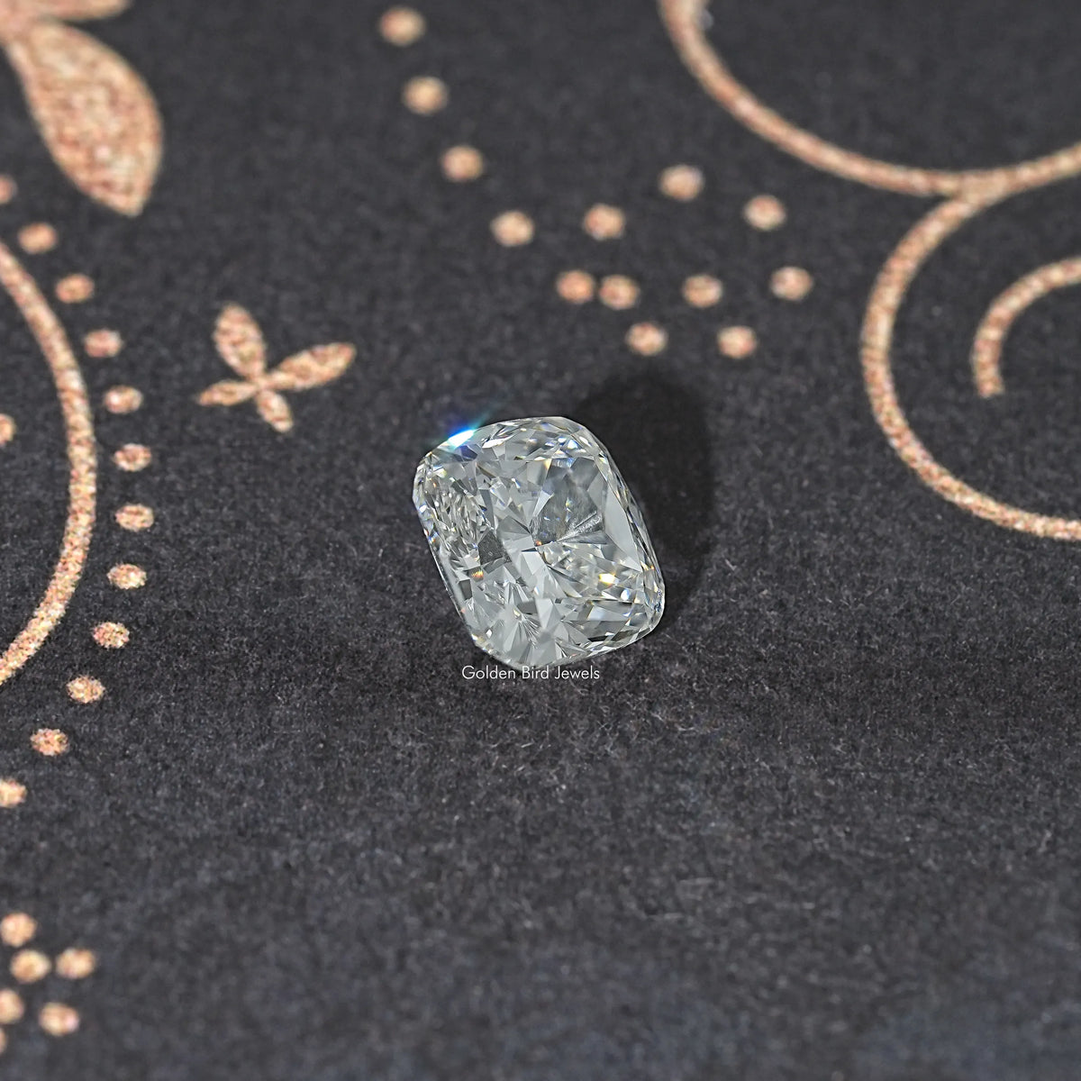 Loose cushion-cut lab diamond with icy sparkle, angled view of faceted gem