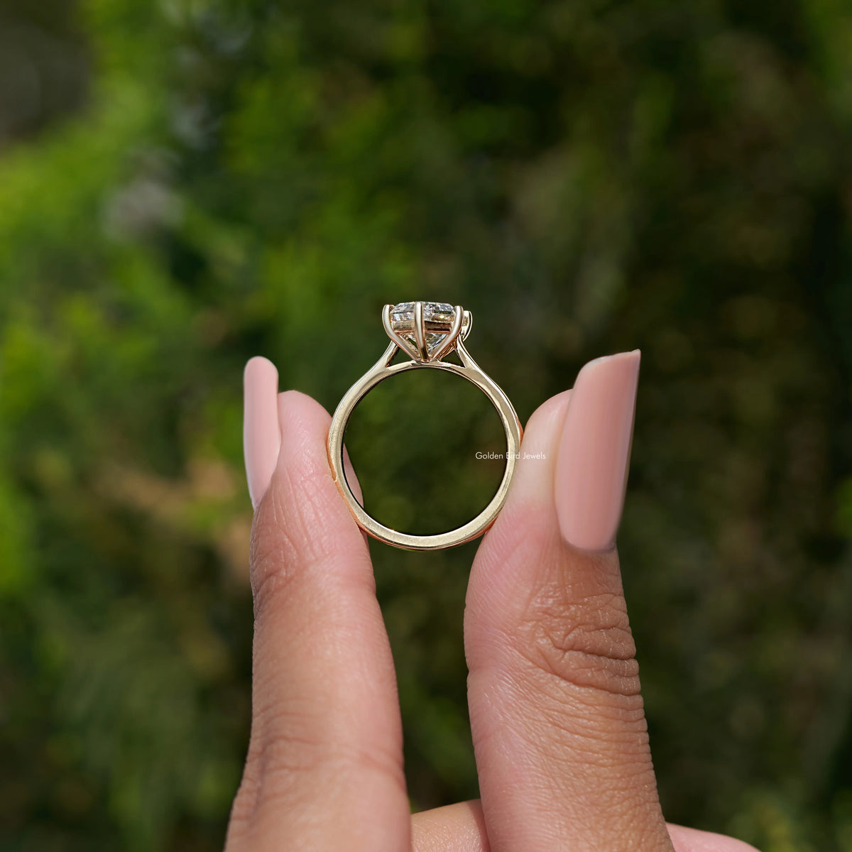 Step-cut marquise diamond ring, open back view with cathedral-style setting
